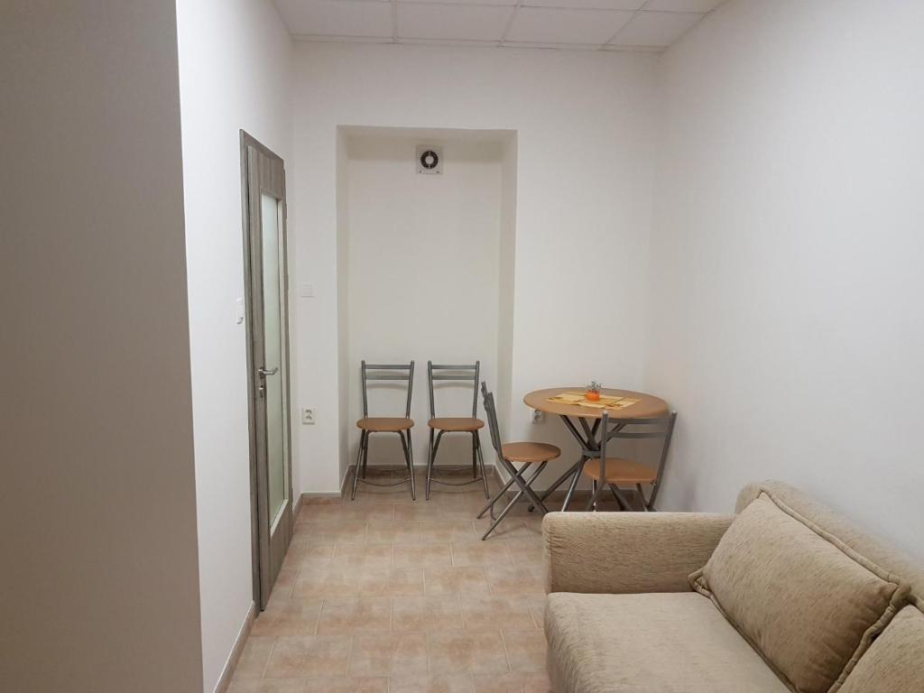 Posezení v ubytování Apartmany u Dvora