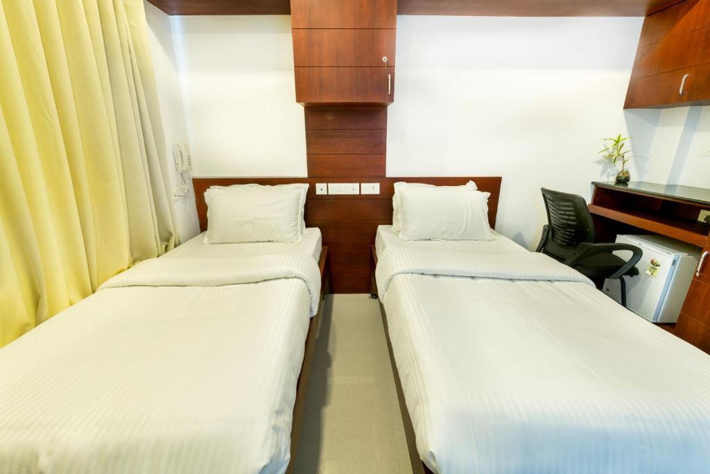 Postel nebo postele na pokoji v ubytování Omnest