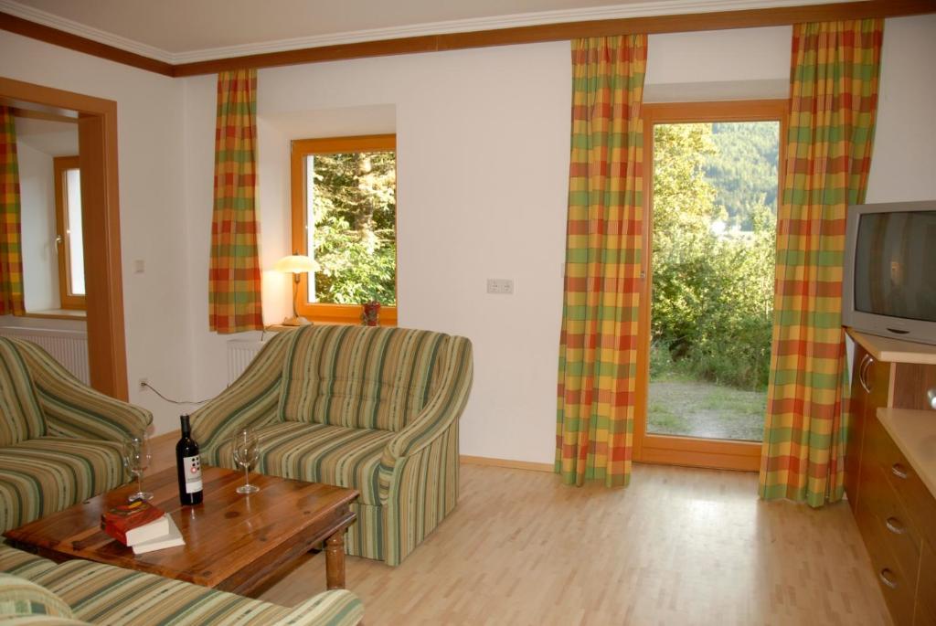 TV a/nebo společenská místnost v ubytování Appartement Aigner