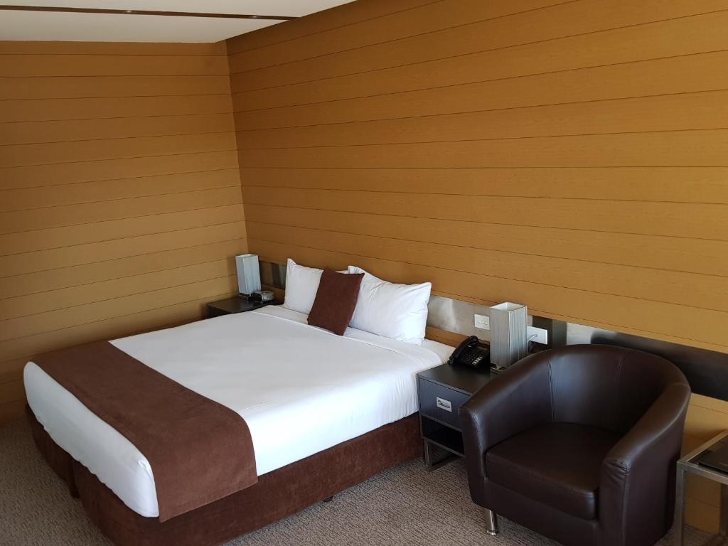 Postel nebo postele na pokoji v ubytování Moura Meridian Motel