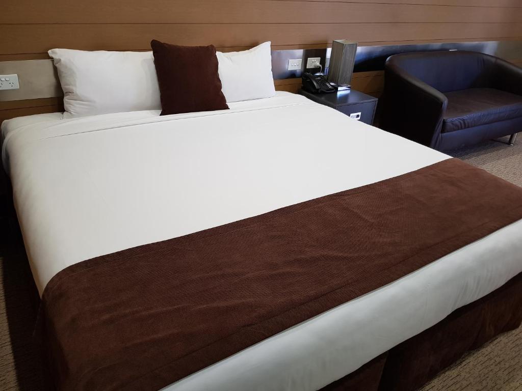Postel nebo postele na pokoji v ubytování Moura Meridian Motel