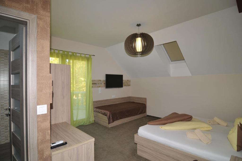 Postel nebo postele na pokoji v ubytování Hotel Corso