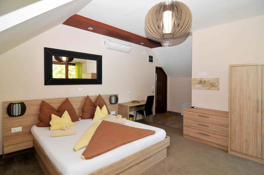Postel nebo postele na pokoji v ubytování Hotel Corso