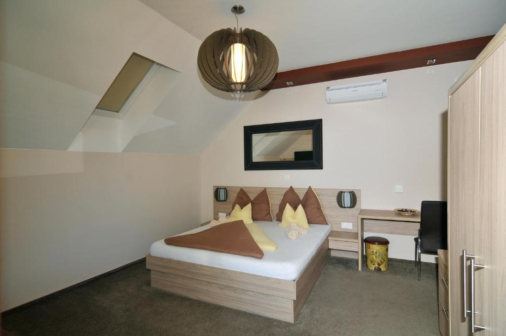 Postel nebo postele na pokoji v ubytování Hotel Corso