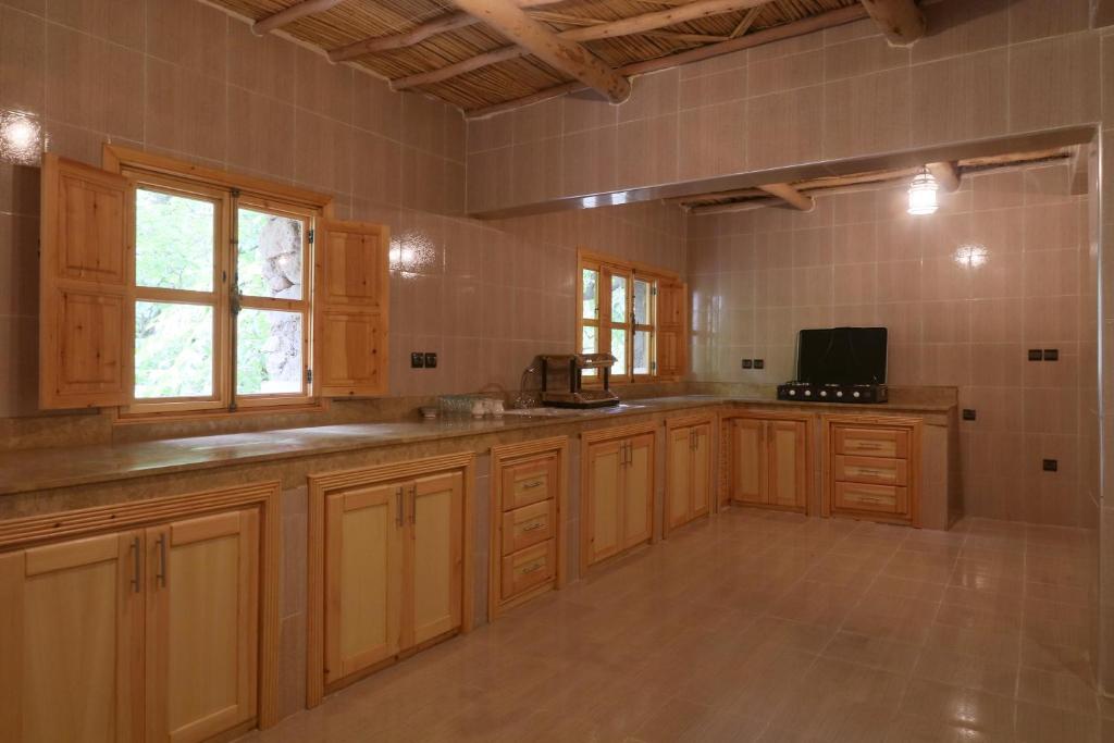 Kuchyň nebo kuchyňský kout v ubytování Hiba Lodge