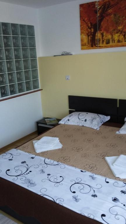 Postel nebo postele na pokoji v ubytování Villa Zorba
