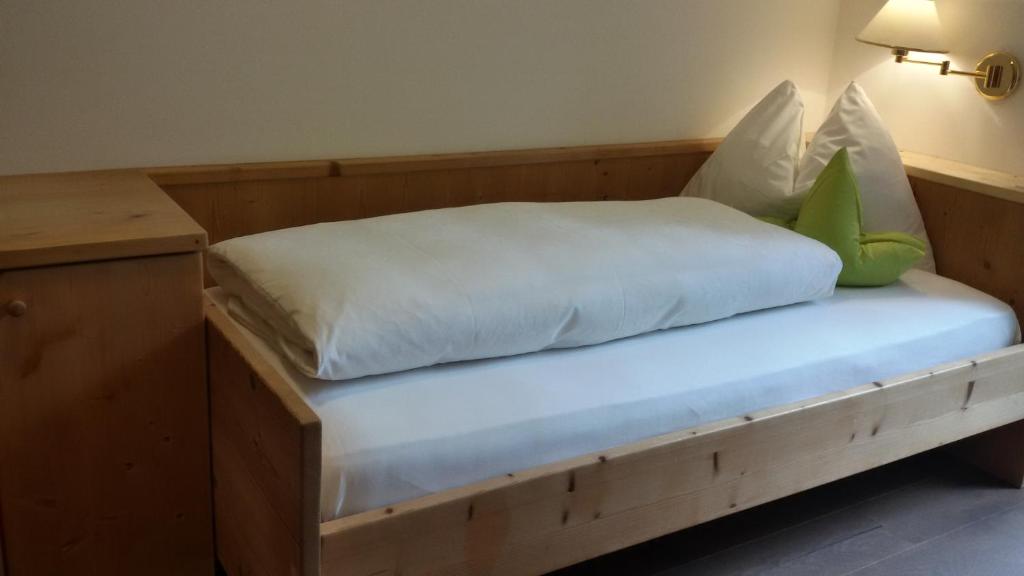 Postel nebo postele na pokoji v ubytování Garni Raffein