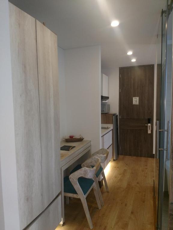 Kuchyň nebo kuchyňský kout v ubytování De Película Hotel