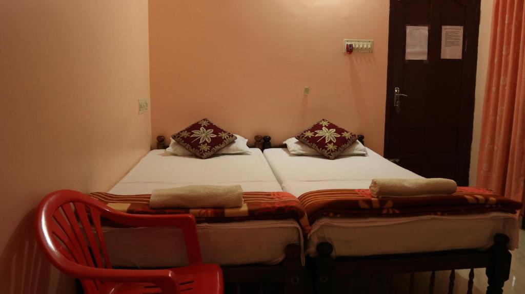 Postel nebo postele na pokoji v ubytování Chackalakkal Home Stay