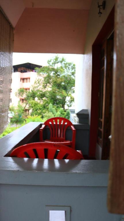 Balkón nebo terasa v ubytování Chackalakkal Home Stay