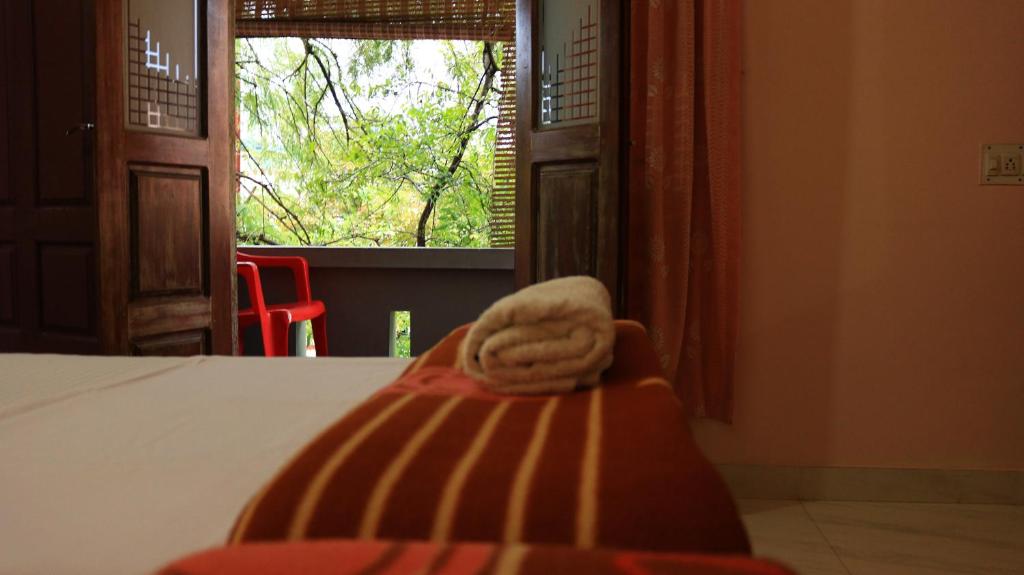 Postel nebo postele na pokoji v ubytování Chackalakkal Home Stay