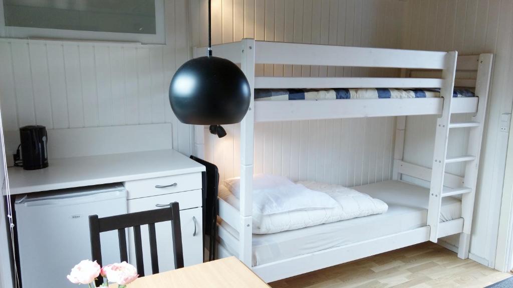 Postel nebo postele na pokoji v ubytování Lystskov Camping & Cottages