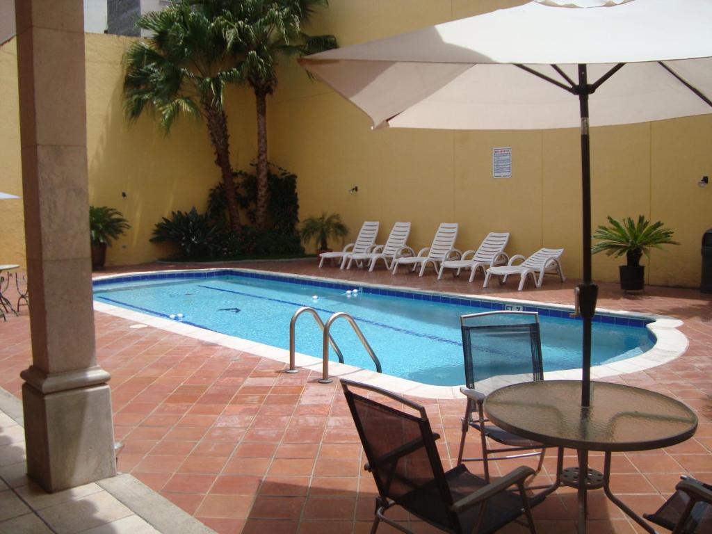 Πισίνα στο ή κοντά στο Hotel Mac Arthur