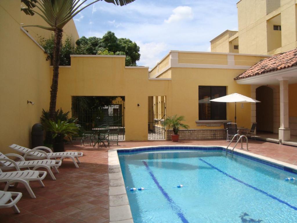 Πισίνα στο ή κοντά στο Hotel Mac Arthur