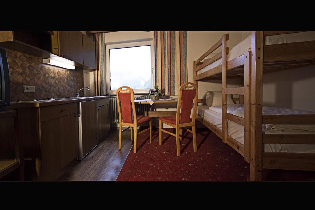 Kuchyň nebo kuchyňský kout v ubytování Lärchenhof