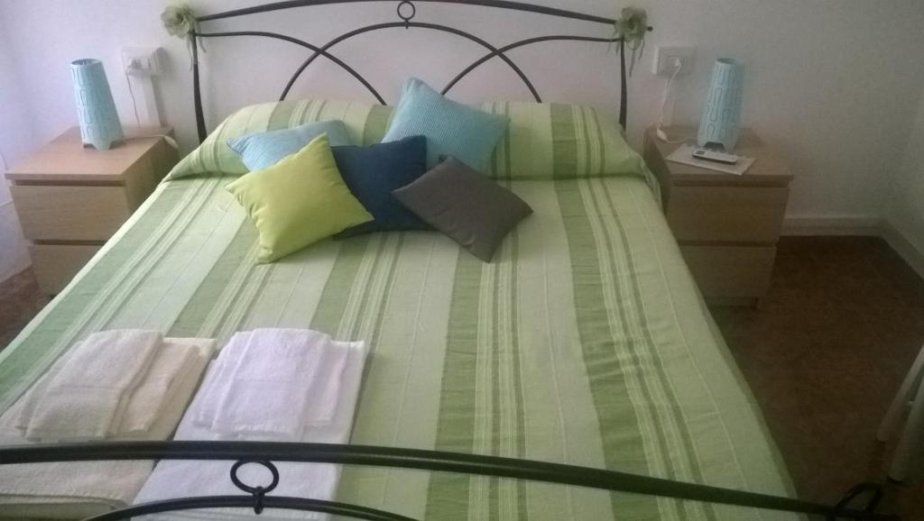 Postel nebo postele na pokoji v ubytování Affittacamere Fiorella