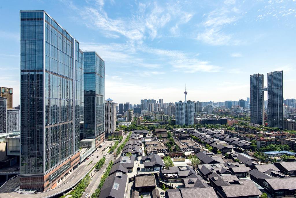 an aerial view of a city with tall buildings at S6 Service Apartment（Chengdu Chunxi Road Taikoo Li Branch） in Chengdu