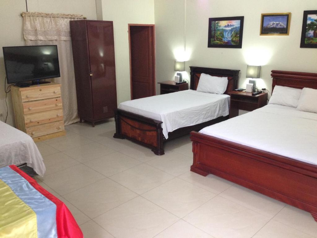 Postel nebo postele na pokoji v ubytování Hotel MundialCity