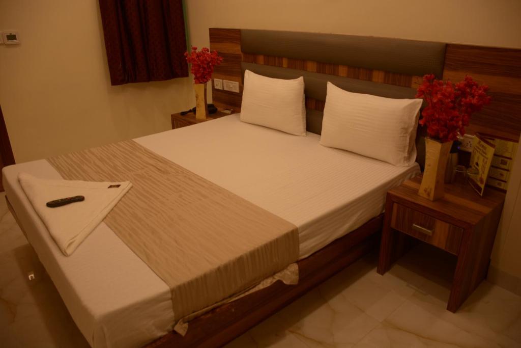 Postel nebo postele na pokoji v ubytování Hotel Golden Oasis - NEAR NEW DELHI RAILWAY STATION