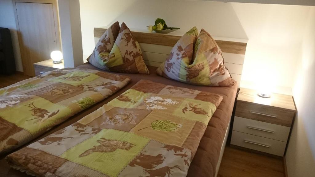 Postel nebo postele na pokoji v ubytování Fitzlhof