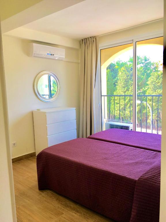 Posteľ alebo postele v izbe v ubytovaní Club Playa Flores