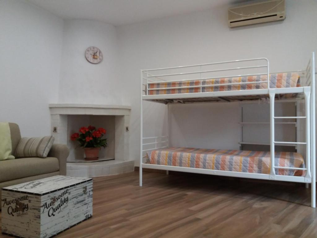 Postel nebo postele na pokoji v ubytování fiori e massi