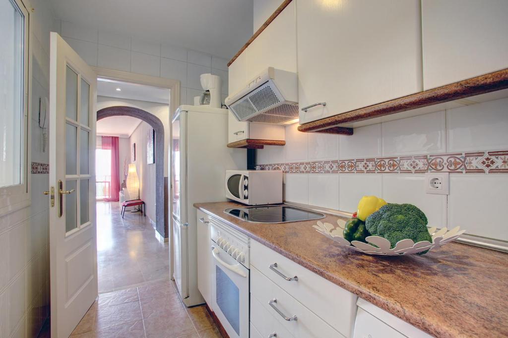Kuchyňa alebo kuchynka v ubytovaní Apartamento El Faro Leisure Port