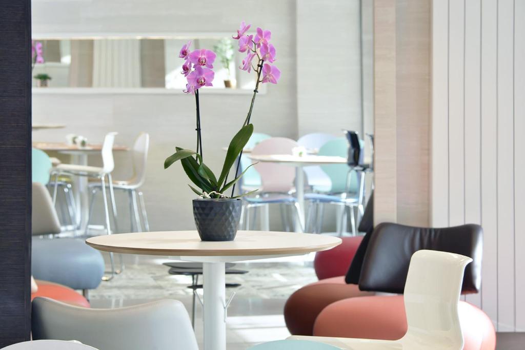 Posezení v ubytování Hotel des Alpes