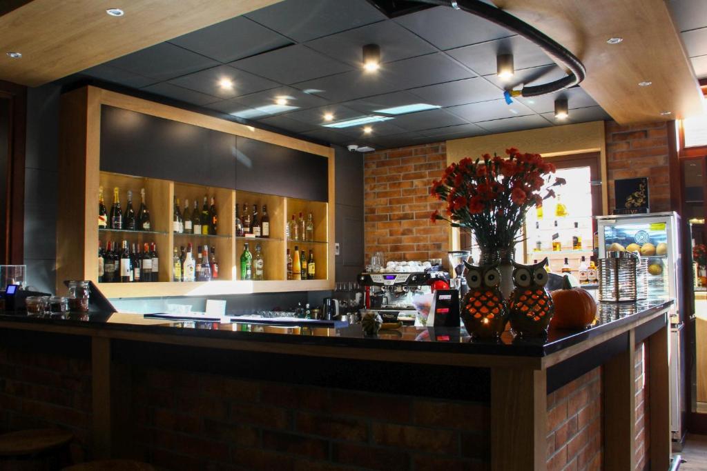 Nápoje v ubytovaní Hotel Rad