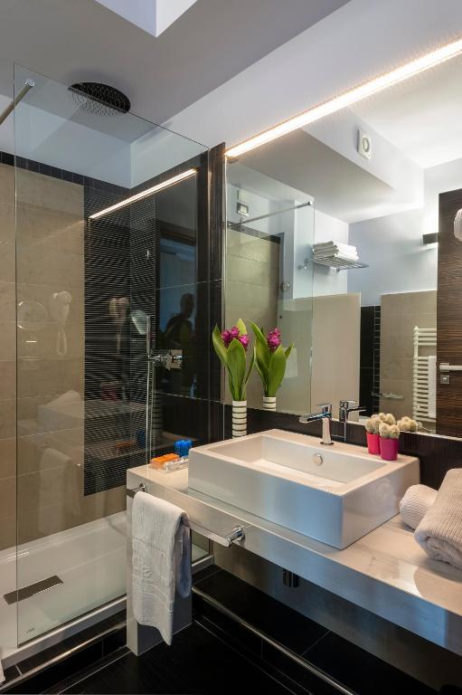 Kúpeľňa v ubytovaní Le Dune Suite Hotel