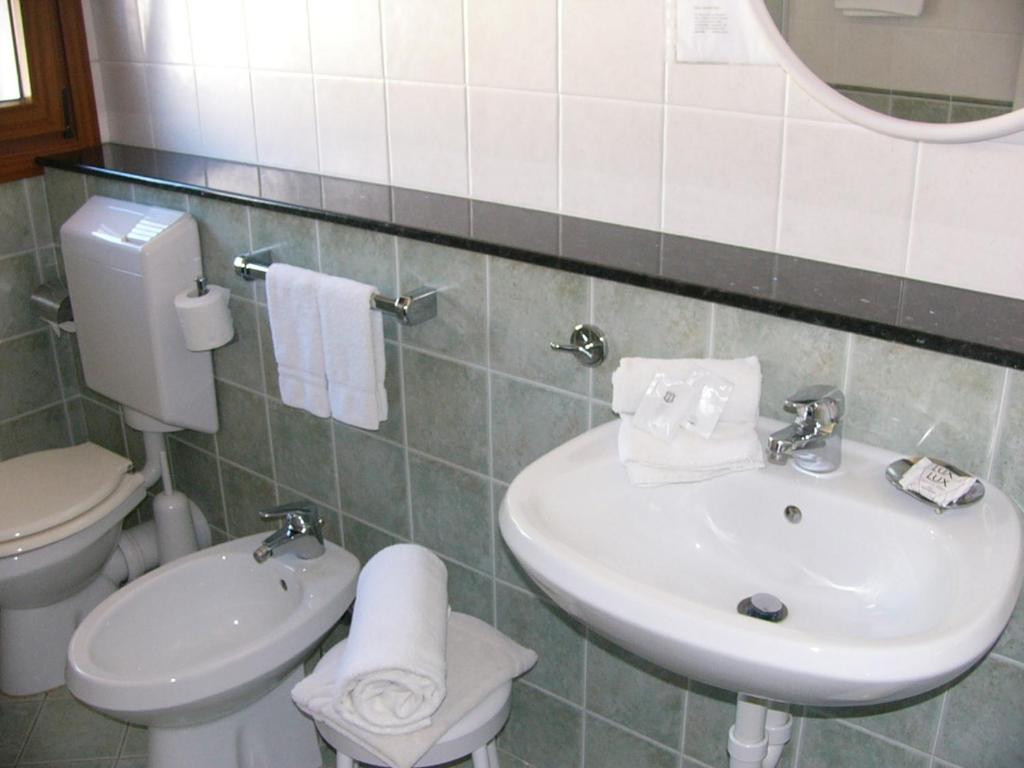Koupelna v ubytování Hotel Serena