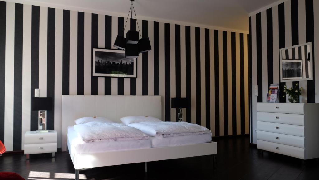 Voodi või voodid majutusasutuse Backstage Hotel toas