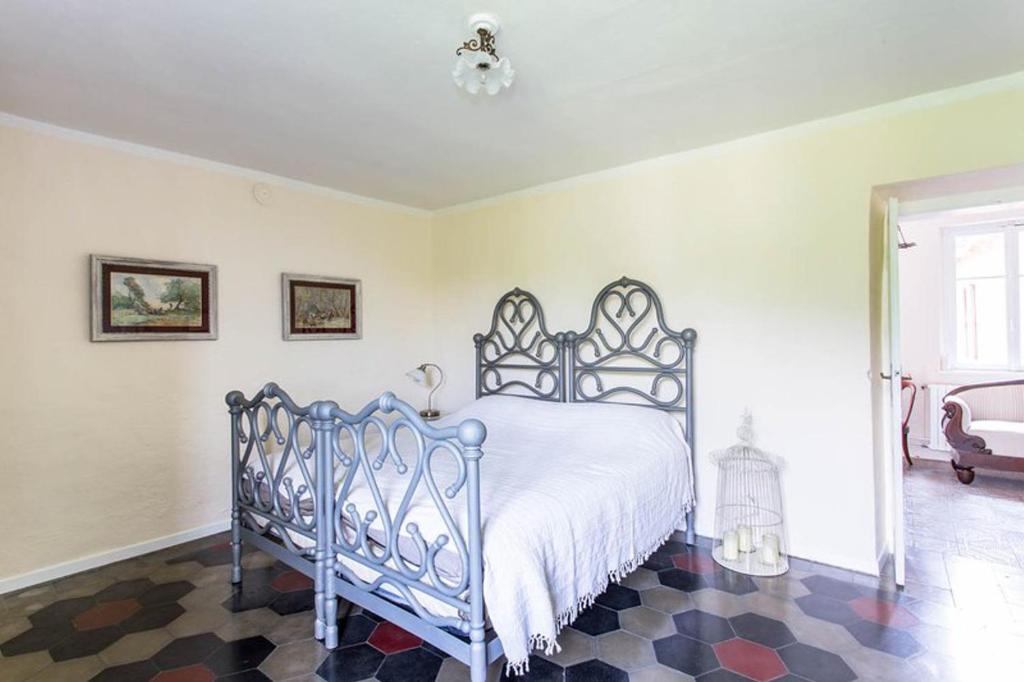 Posteľ alebo postele v izbe v ubytovaní Villa Sassi