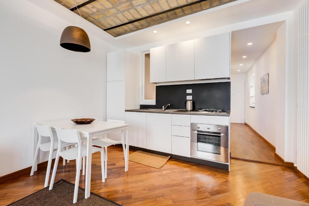 A kitchen or kitchenette at Piazza Navona-Coronari House