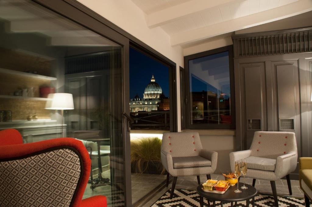Un lugar para sentarse en Trianon Borgo Pio Aparthotel