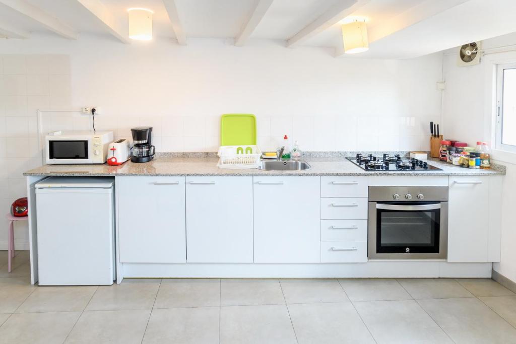 A kitchen or kitchenette at Private Roof Top Sant Antoni