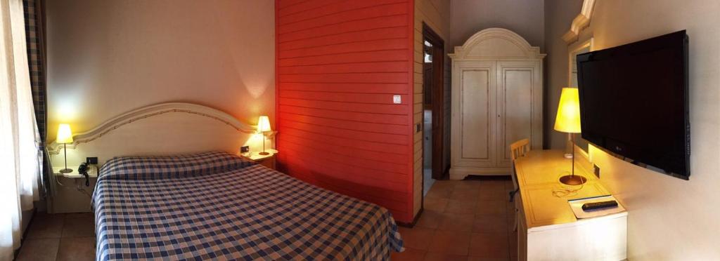 Postel nebo postele na pokoji v ubytování Motel 7 Laghi