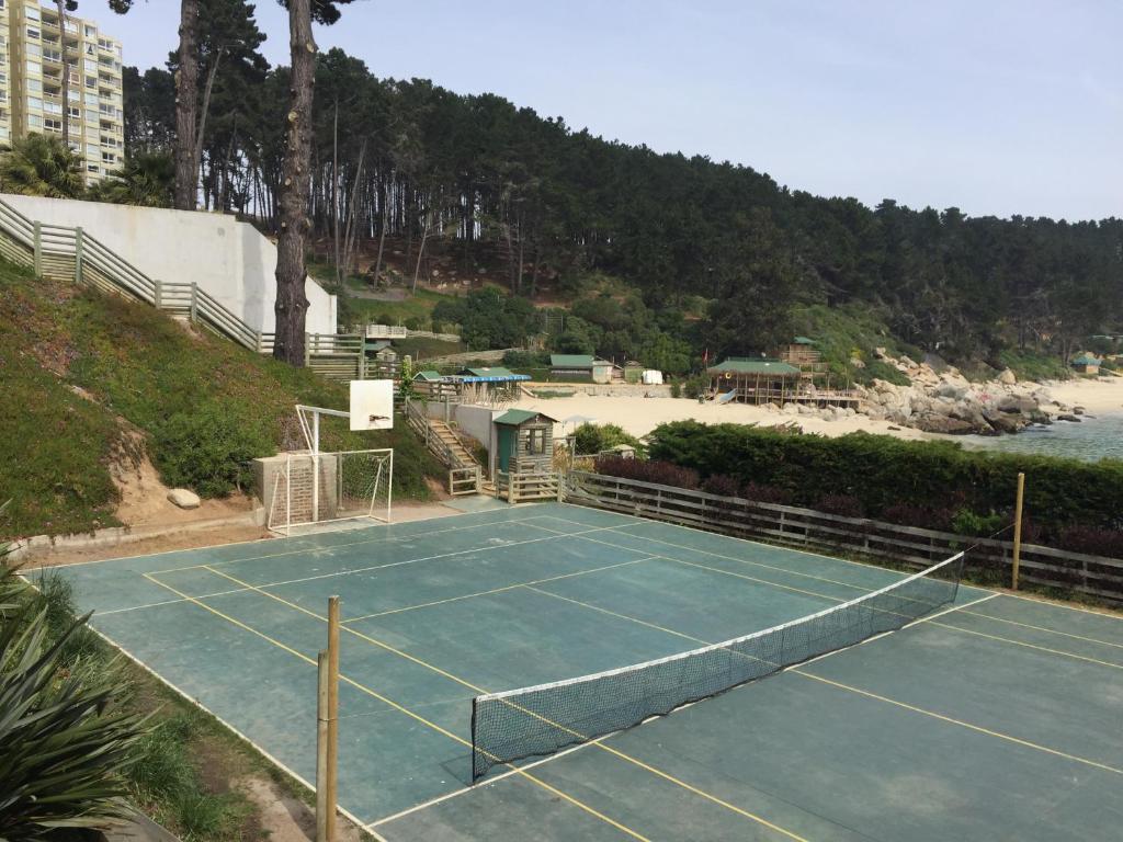 Tenis a/nebo squash v ubytování Departamento en la Playa nebo okolí