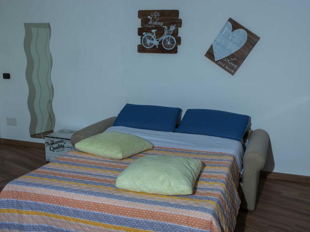 Postel nebo postele na pokoji v ubytování fiori e massi