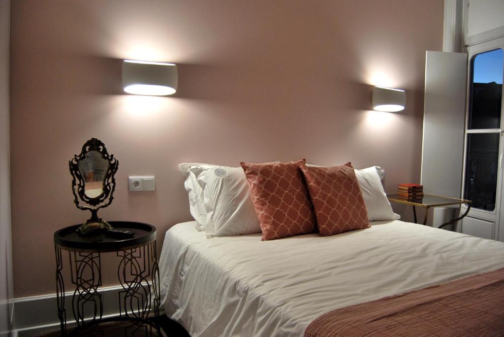 Cama ou camas em um quarto em Guest House Santa Clara