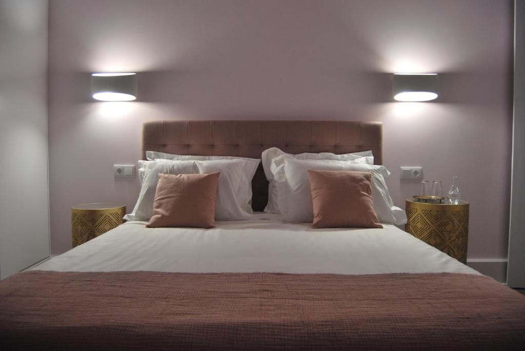 Cama ou camas em um quarto em Guest House Santa Clara