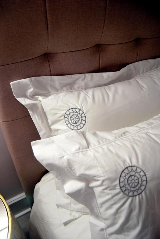 Cama ou camas em um quarto em Guest House Santa Clara