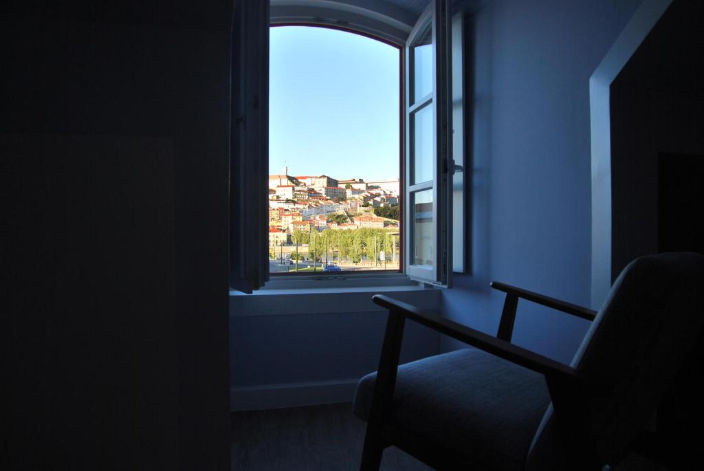 Uma área de estar em Guest House Santa Clara
