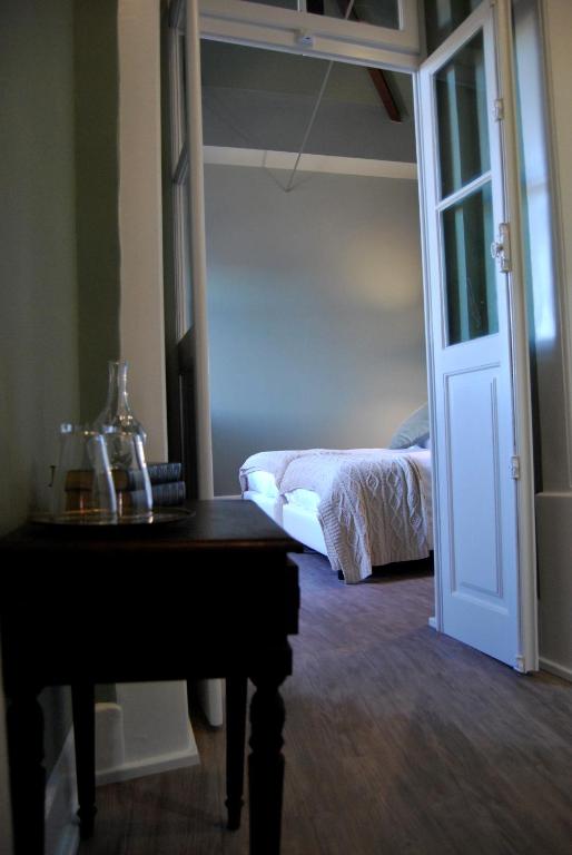 Cama ou camas em um quarto em Guest House Santa Clara