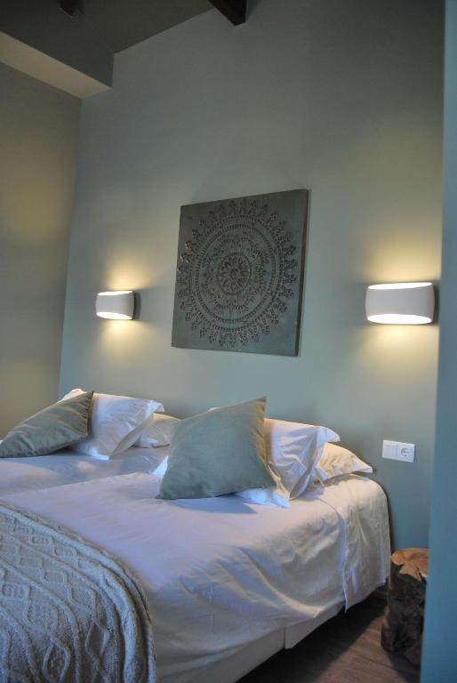 Cama ou camas em um quarto em Guest House Santa Clara