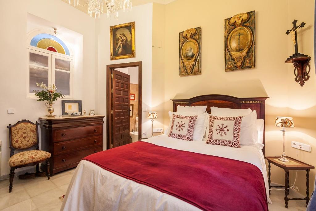 Posteľ alebo postele v izbe v ubytovaní CASA SEÑORIAL EN SEVILLA CENTRO,Calle Mármoles