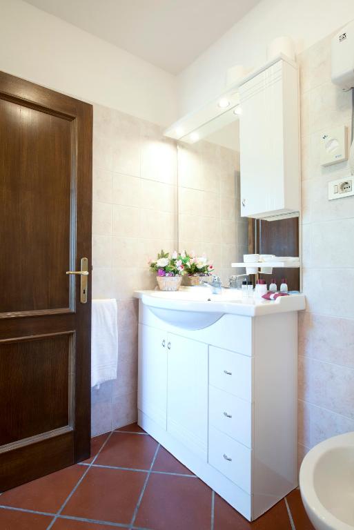 Kuchyň nebo kuchyňský kout v ubytování Hotel Il Pietreto