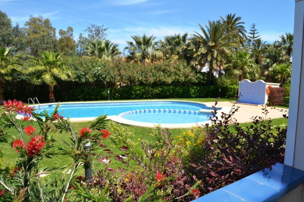 Bazén v ubytování Las Olas Pili LOCDENIA nebo v jeho okolí