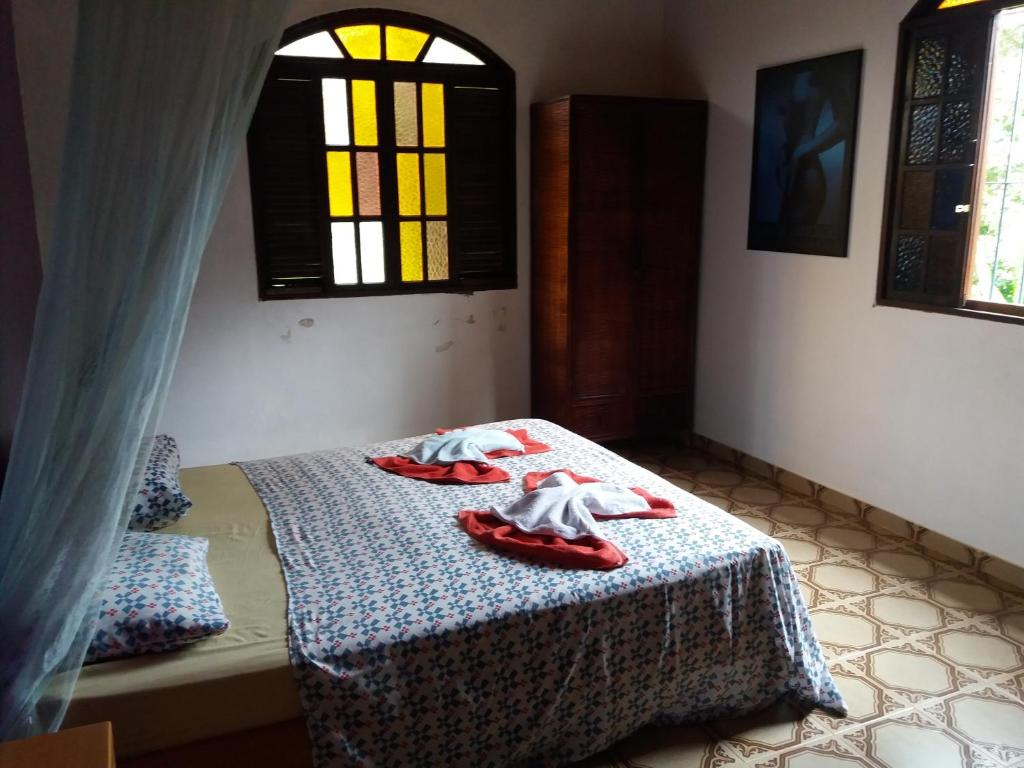 Uma cama ou camas num quarto em Sitio Os Tres