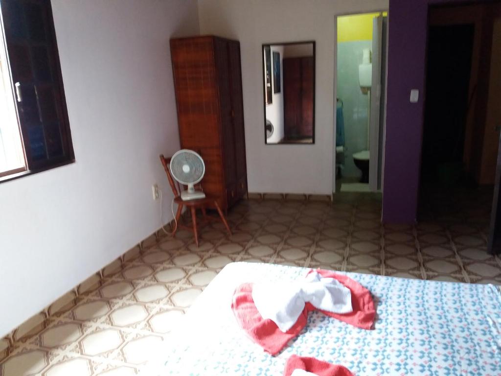 Uma cama ou camas num quarto em Sitio Os Tres